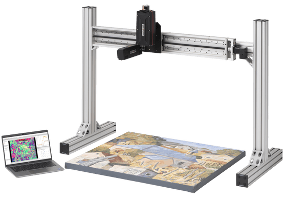 Resonon Large Sample Reflectance Hyperspectral Imaging System imager pointed down scanning a painting of a landscape.