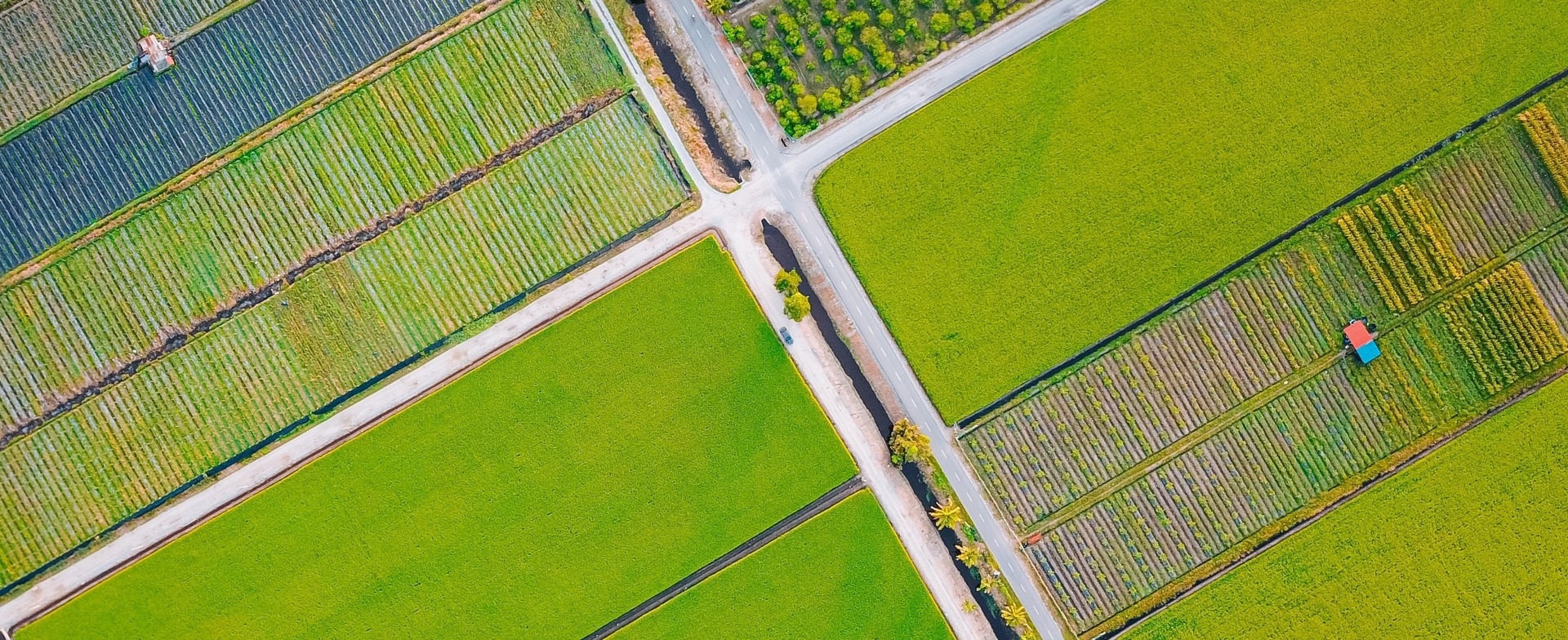 Resonon airborne hyperspectral imaging system over crop field.